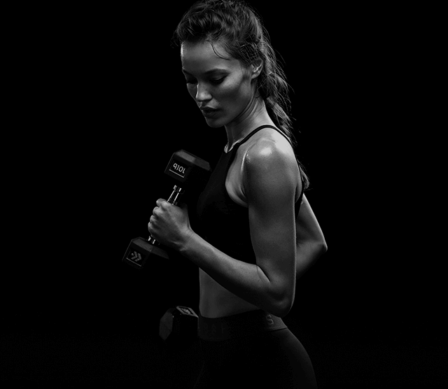 woman exercising with free weight